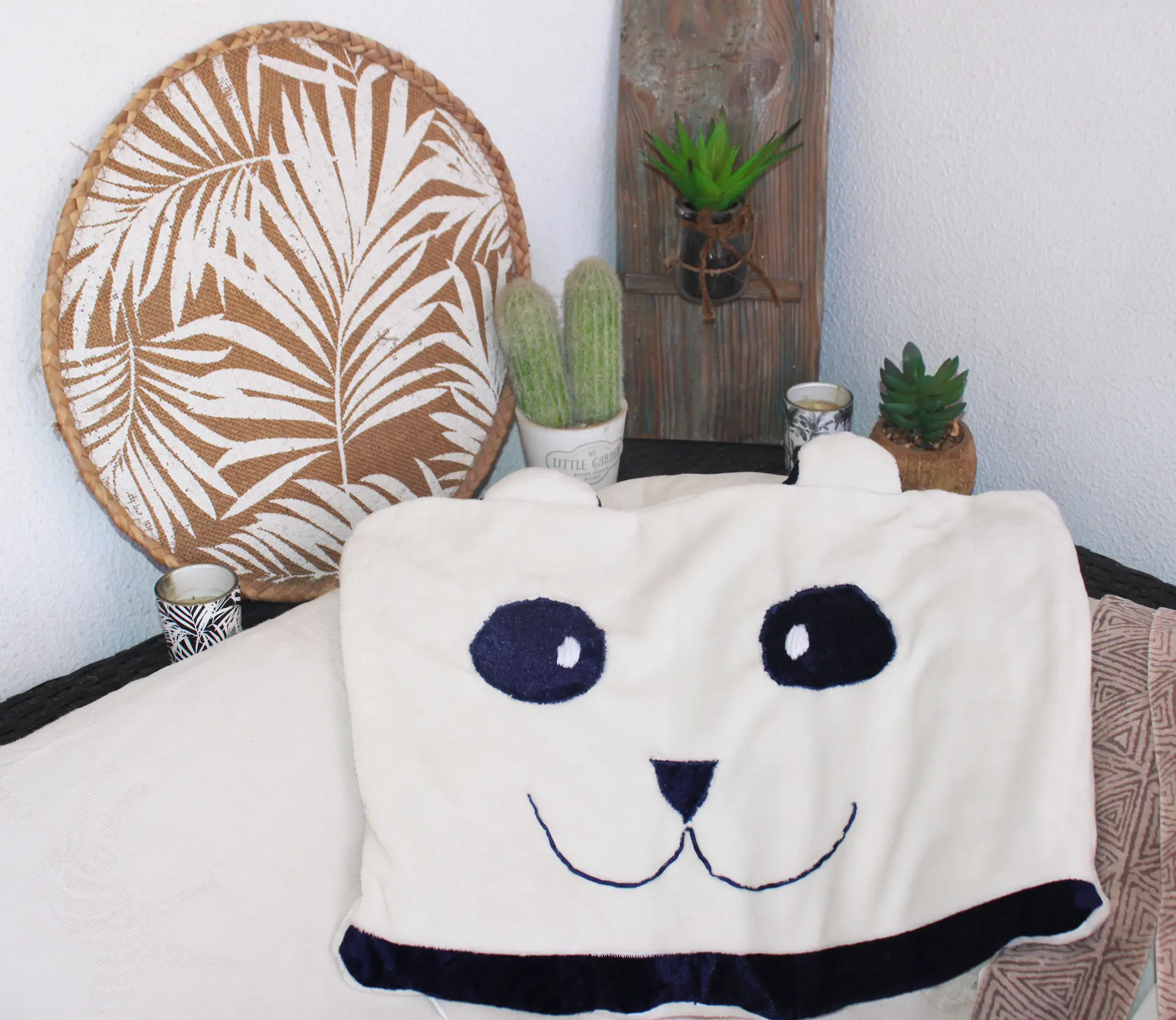 Coussin lesté en forme de panda